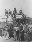 הובלת פרי הדר במשאית ועובדי בית האריזה